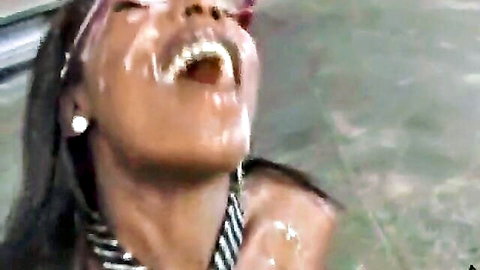 Black model Taylor smiling with white cum on her face and open mouth