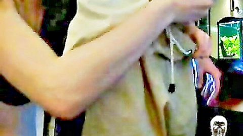 Hands gripping thick blue and purple dildos in amateur webcam toy tease