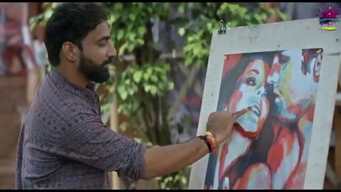 Bearded Indian artist painting hot couple portrait in erotic Hindi movie scene