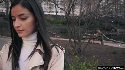 Emily Willis in trench coat, sultry outdoor gaze, BBC star