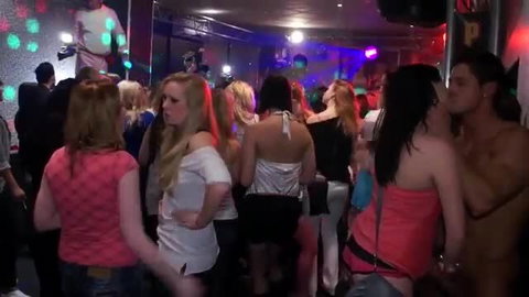 Horny girls wildly partying and grinding nude guy in nightclub orgy