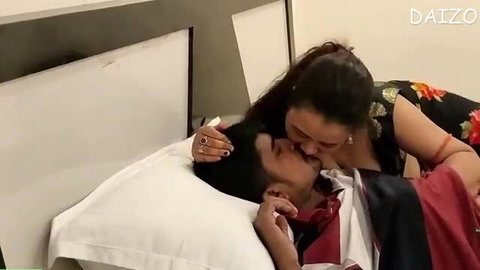 Indian Aunty Kissing Desi Man on Bed in Hotel Room