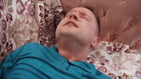 Cyber Doll with man in ecstasy on bed, intense adult scene