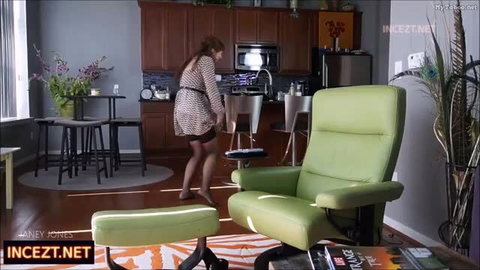Janey Jones bending over in short dress flashing ass in kitchen