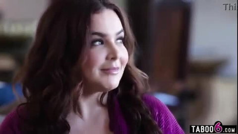 Natasha Nice busty MILF stepmom smiling in purple sweater