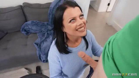 Nadia White kneels smiling at Jimmy Michaels' cock closeup