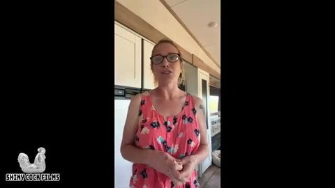 Jane Cane in red floral dress, mature redhead stepmom in kitchen