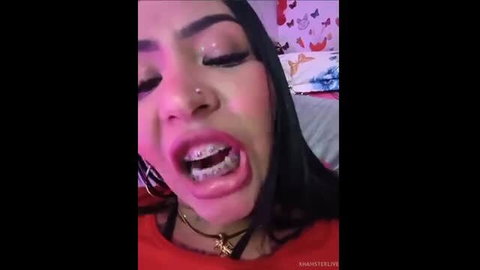Gabilicious25 Latina with braces flashing open mouth closeup