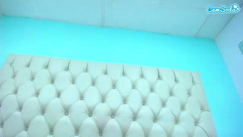 Wet Lexi69 on tufted bed in blue room cam view