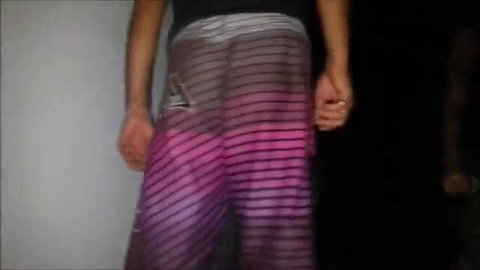NandoAndSara in colorful striped pants, teasing gratitude BJ preview