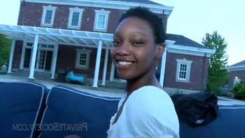 Cute Girl smiling outdoors in white top, brief stopover companionship