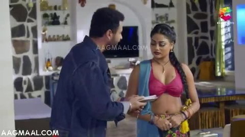 Indian Dhanno Doodhwali in sexy saree blouse exposing cleavage and midriff