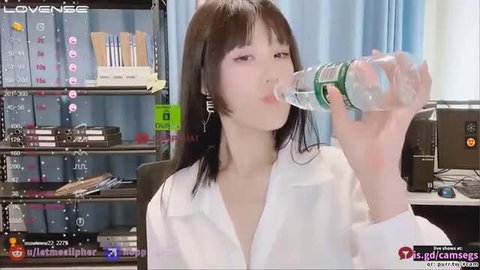 SASA drinks water in open white blouse, teasing office cleavage