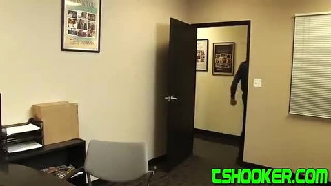 Shemale in office enters room for gloryhole fuck action