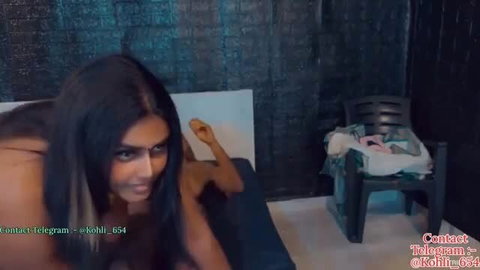 Exotic Indian babe with big tits topless spreading legs teasing