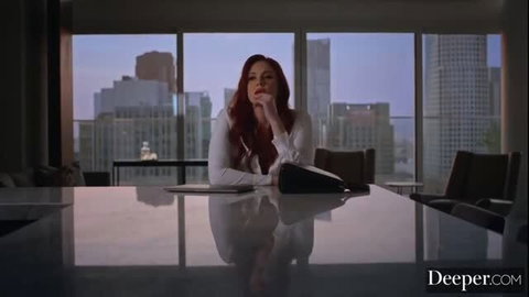 Lena Paul pensive in white blouse, red hair, city view penthouse