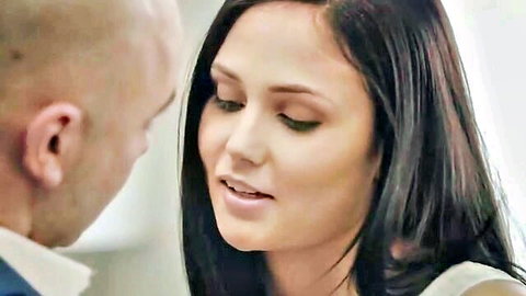Bald man intensely gazing at sexy brunette babe's parted lips in close-up intimacy