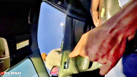 Ebony hand smeared with blood prying open car door at night