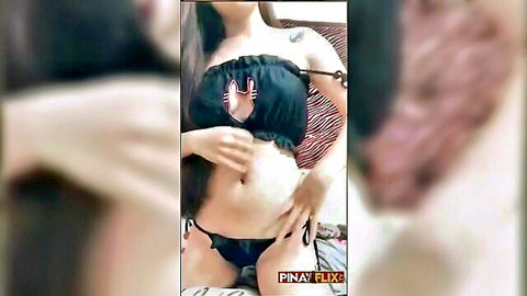 Sexy Filipina in black cat lingerie teasing solo pose