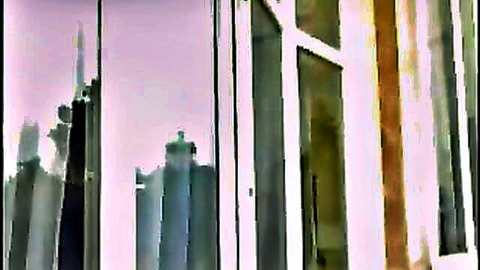 Lucy Lee in High Sex Society, blurry window view with city reflections