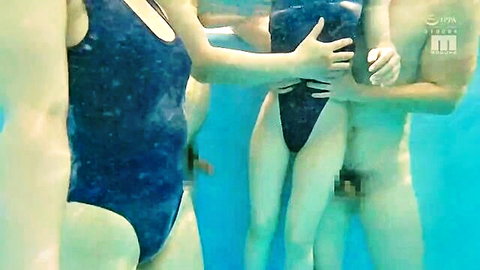 Japanese women in shiny blue swimsuits groping nude men's erect cocks underwater orgy