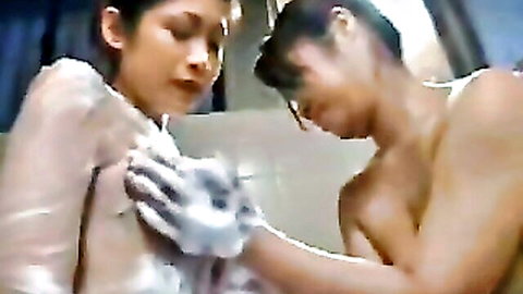Japanese lesbian mom and daughters in soapy bath touching breasts