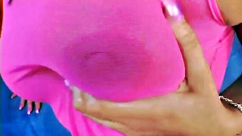 Cindy Lords teasing in tight pink top with cleavage and wet spot
