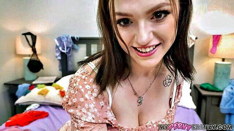 Gracie Gates smiling in low-cut pink floral dress, step-sis tease