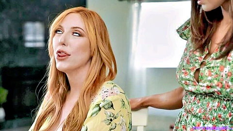 Busty redhead and brunette stepmoms in floral dresses teasing intimately