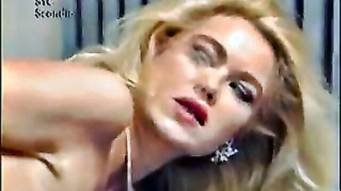 Sybille Rauch blonde seductress in threesome tease, curvaceous pose