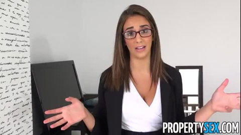 Madison Wilde real estate agent in blouse and skirt gesturing