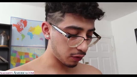 Handsome Latino guy with curly hair, glasses, earrings topless closeup