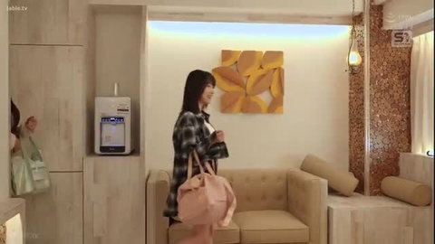Yuri Adachi in sauna lobby, plaid shirt, pink bag, giant tits tease