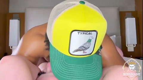 Bossmane in yellow trucker hat facesitting busty pink lingerie woman