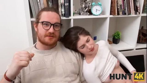Hot Pearl cuddles redhead guy on couch in Hunt4K video