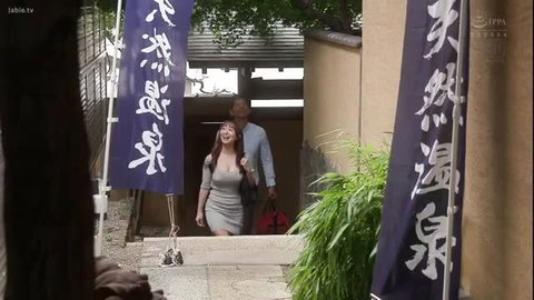 Shiori Shiraki in tight gray dress at Japanese shrine, cleavage tease