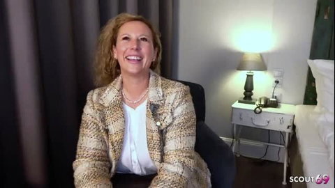 Kathy Deep German BBW mature smiling in tweed blazer big tits