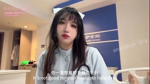 Asian nurse in uniform warns patient it's bad for health to hold it in