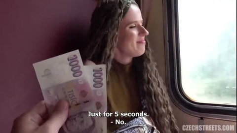 Vanessa Alessia smiles at 1000 CZK bills on Czech train, Czech Streets