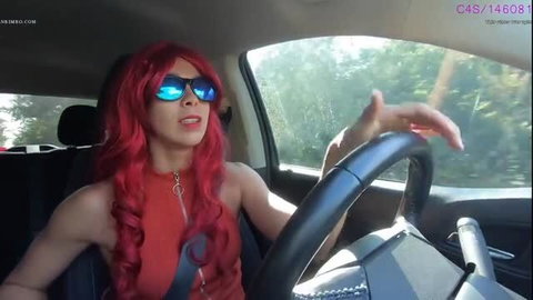 Mona Kim as redhead Bondage Bandit Alexa driving in sexy top and shades