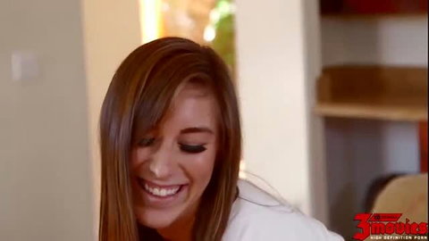 Smiling innocent cheerleader with bangs turns 18 in white top