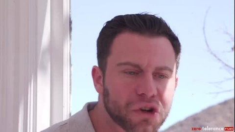 Handsome bearded man with intense gaze in Zero Tolerance adult video thumbnail
