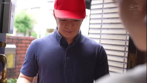Momo Marina lookalike in red cap, blue polo at outdoor door
