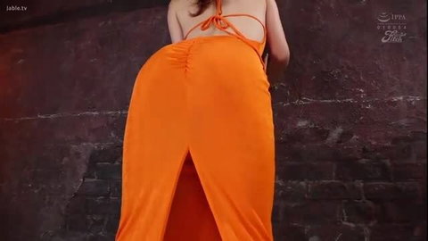 Tall busty model Kikuno Ran in tight orange backless dress, huge ass view