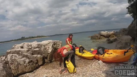 Teen hotties Cheri & Rebeka bend over kayaks in steamy beach lesbo tease