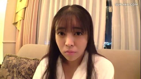 Hatsuzuki Noa in robe, sultry gaze, JAV big tits tease
