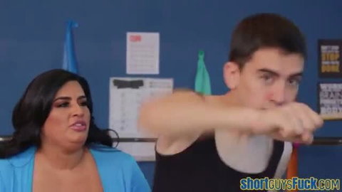 Sofia Rose with short guy punching pose in office, BBW tits out