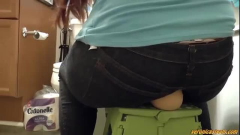 Veronica Steam redhead with huge ass sitting on toilet seat egg in tight jeans