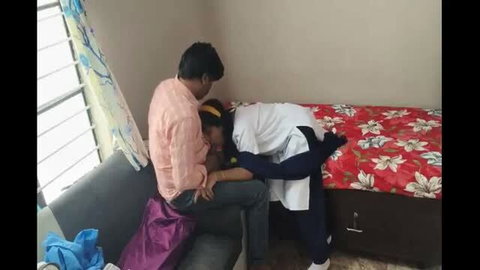 Indian college girl in nurse outfit kneels to suck sir's cock, bent over for doggy