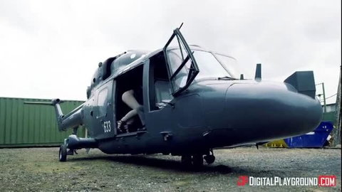 Nicolette Shea legs out of Sea King helicopter door